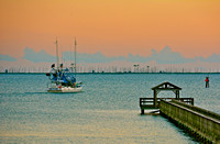 Gulf Oaks pier and the "Mark & Dawn" with Deer Island in the background (the end that burned) on Fro