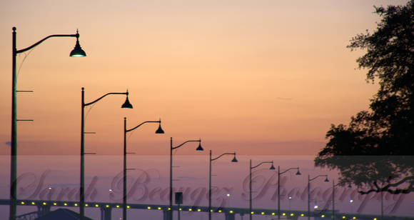Light poles in the sunset